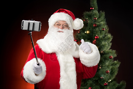 圣诞老人自拍 圣诞帽 新年 水平的 圣诞老人胡子 圣诞节 快乐的 礼物图片
