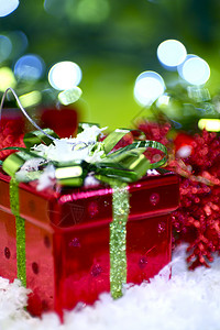 圣诞节礼物 展示 假期 季节性的 灯光 分享 粒子 弓 下雪的背景图片