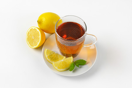 茶杯加柠檬 热的 透明的 非酒精性 红茶 饮料 飞碟 玻璃 喝背景图片