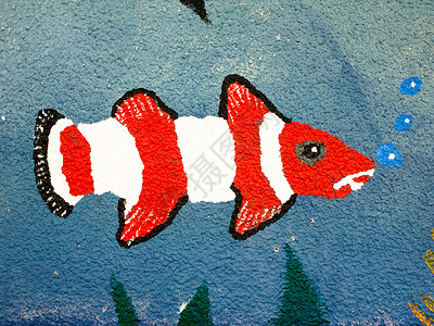 鱼店墙绘素材墙上一面漆着的鱼 紧贴着气泡背景