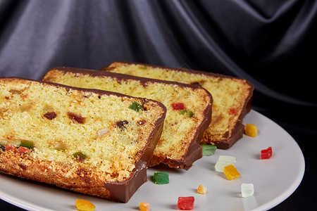 小块蛋糕水果饼和小块果实 巧克力 照片 食物 下午 美食 葡萄干背景