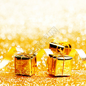 节日礼物盒 惊喜 丝带 金子 装饰风格 弓 卡片 闪光背景图片