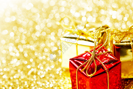 节日礼物盒 黄色的 生日 金的 展示 盒子 装饰风格 闪亮的背景图片