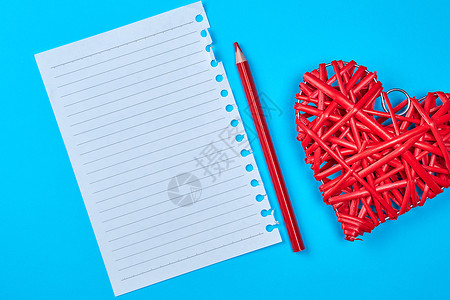 一条直线的白纸和一支红色的木笔背景图片
