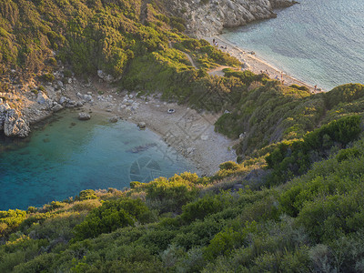 莫负时光科孚 希腊 波多蒂莫尼 从路边的景点看阿菲奥纳斯最著名的双海滩和海湾 金色时光日 蓝色的 海景背景