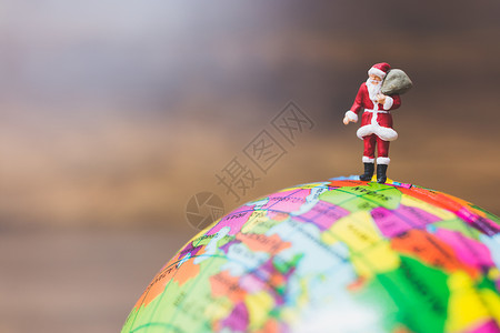 圣诞老人环绕着地球奔波 Y H 有趣的 帽子背景图片