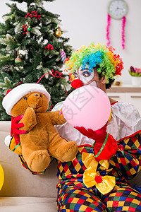 圣诞庆典中搞笑的小丑概念 艺人 有趣的 傻子 家图片