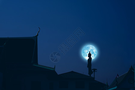 夜空中的星期天佛陀和蓝色月亮高清图片