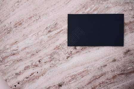 以石本背景 豪奢品牌平板版和模型品牌身份设计为名牌的黑商卡纸板 床单 石头背景图片