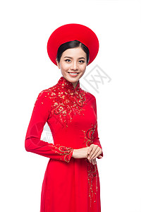 一位美丽的亚洲妇女穿着传统节服Ao Dai Tet节日 月经新年的肖像 化妆品 年轻的背景图片