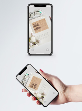 书籍上放着眼镜小清新摆拍手机壁纸模板