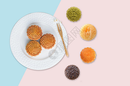 中秋月饼美食中秋月饼背景设计图片