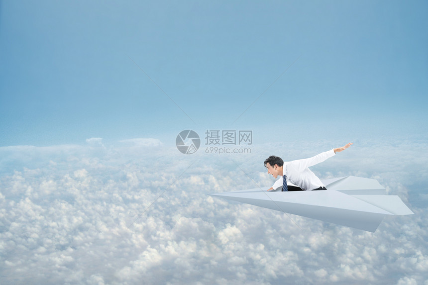商人在纸飞机上图片