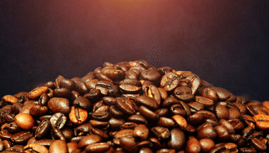 好喝的拿铁咖啡创意咖啡豆背景设计图片
