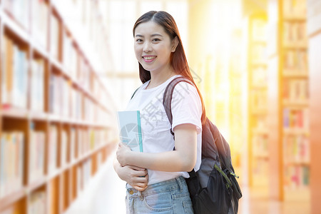 背包女生大学生图书馆学习设计图片