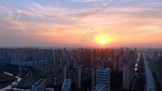 城市日落风貌美丽晚霞航拍城市建筑GIF高清图片