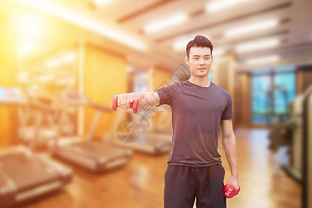 年轻男子器材健身健身房运动设计图片