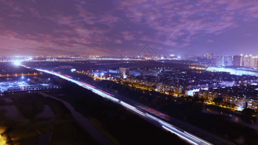 傍晚城市天空俯瞰城市震撼夜景交通延时GIF高清图片