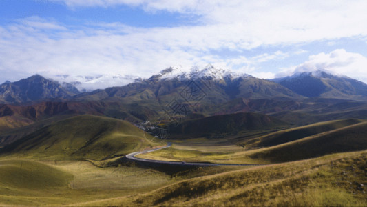 蜿蜒道路延时扎尕那雪山GIF高清图片