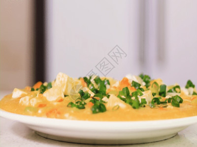 厨房绿色蟹黄豆腐制作成品GIF高清图片