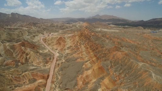 沙漠中的车甘肃张掖丹霞国家地质公园航拍视频GIF高清图片