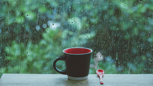 阳台柜雨天水珠玻璃咖啡杯gif动图高清图片