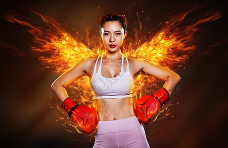 健身房拳击带着火焰翅膀的运动美女设计图片