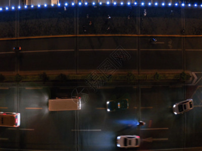 垂直霓虹灯条纹都市夜景车流航拍GIF高清图片