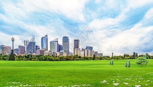 蓝天白云草地建筑天空草地背景设计图片