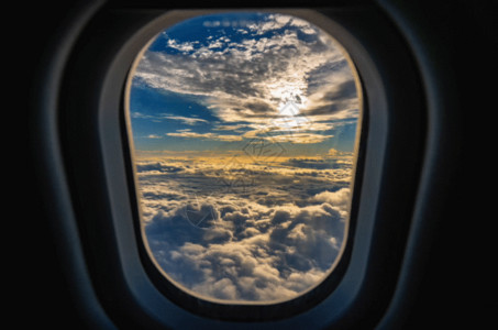 太阳蓝天白云飞机窗外的美丽云海gif高清图片
