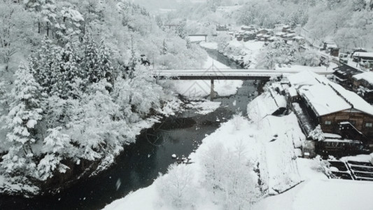 旅行冬天航拍日本下雪天白川乡GIF高清图片