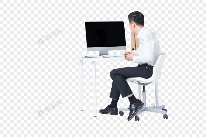 白领坐在办公桌前工作图片