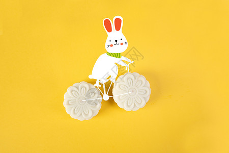 凤梨冰皮月饼骑车的小兔子插画