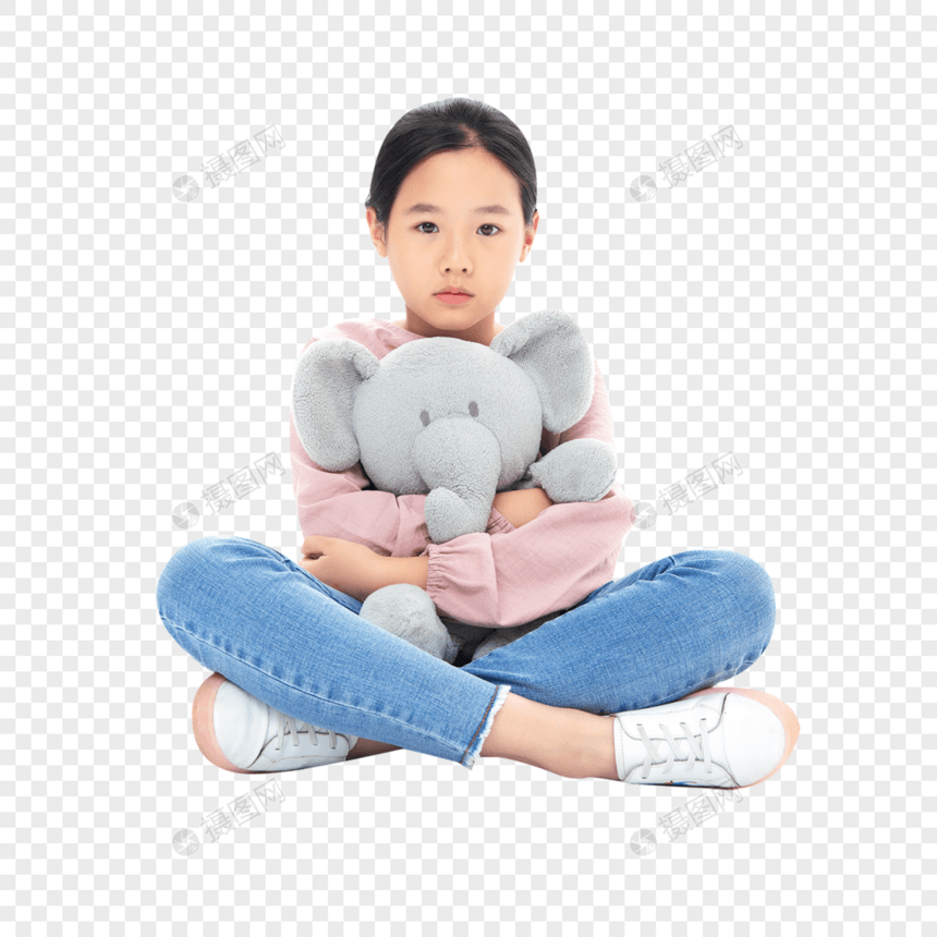 抱着玩具小象失落的小女孩图片