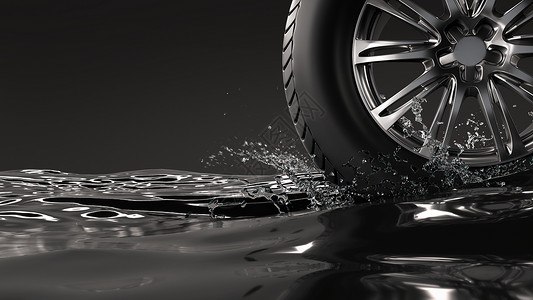 抽象黑色水花在水面滚动的轮胎设计图片