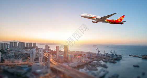 红眼航班城市上空的飞机设计图片