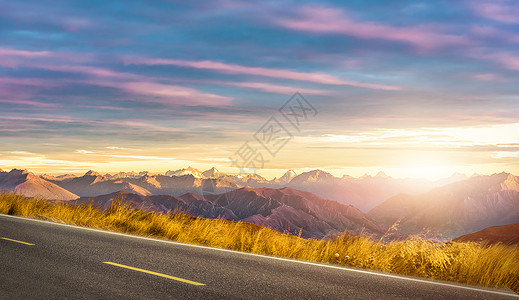 山峦风景美丽的乡村公路背景设计图片