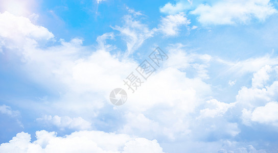 阳光与海滩蓝天白云背景设计图片