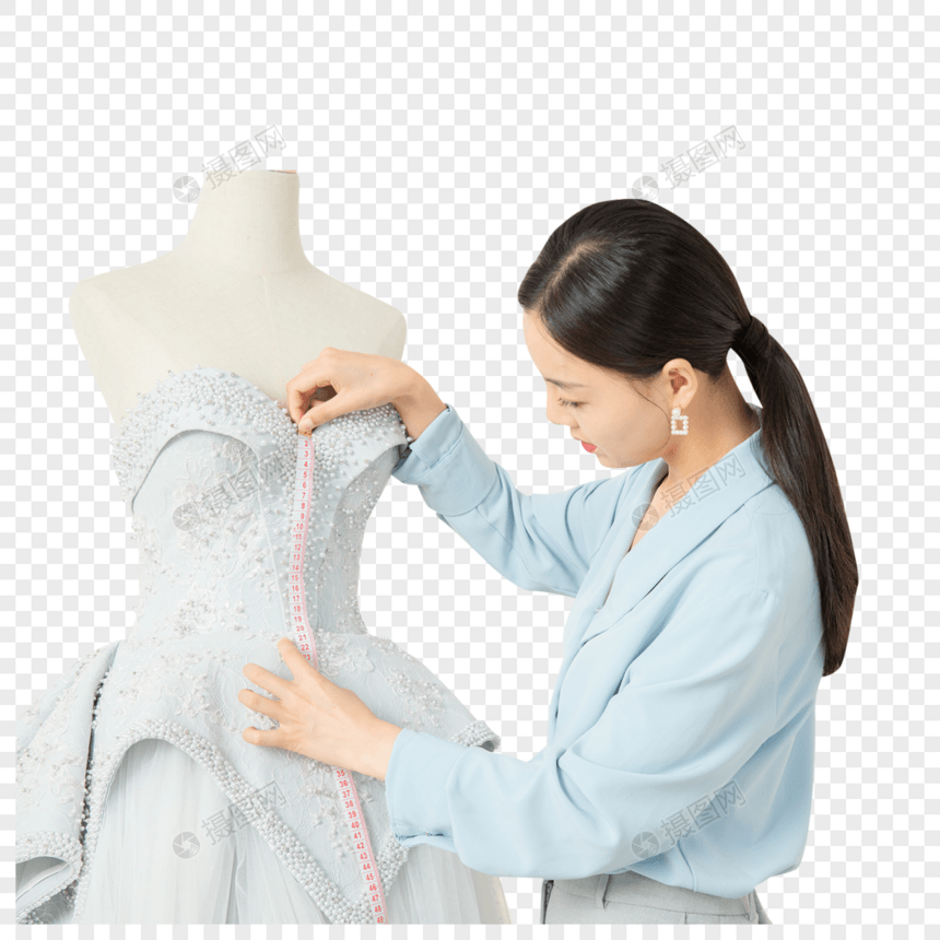 使用皮尺测量婚纱尺寸的设计师图片