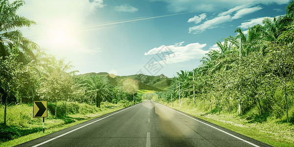 郊外的风景绿化公路背景设计图片