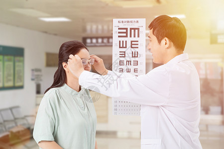 测视力的医生全国爱眼日设计图片