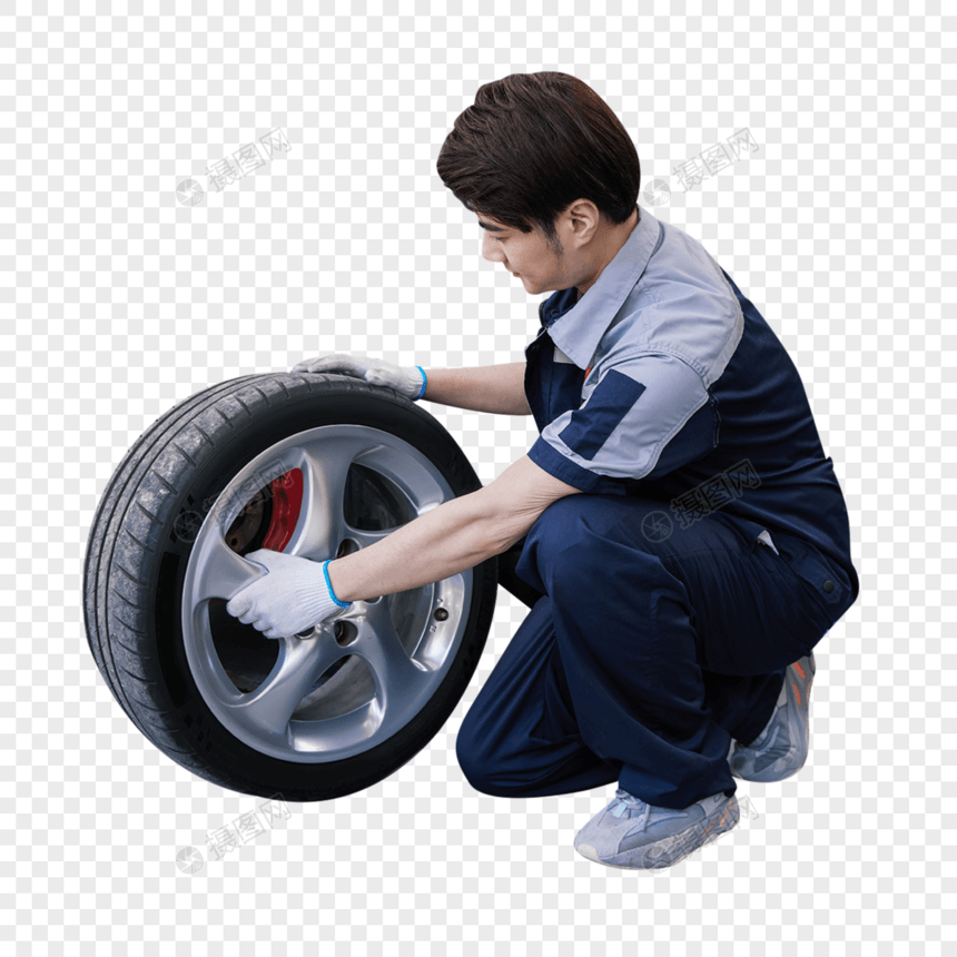 汽车修理工人拆卸汽车轮胎图片