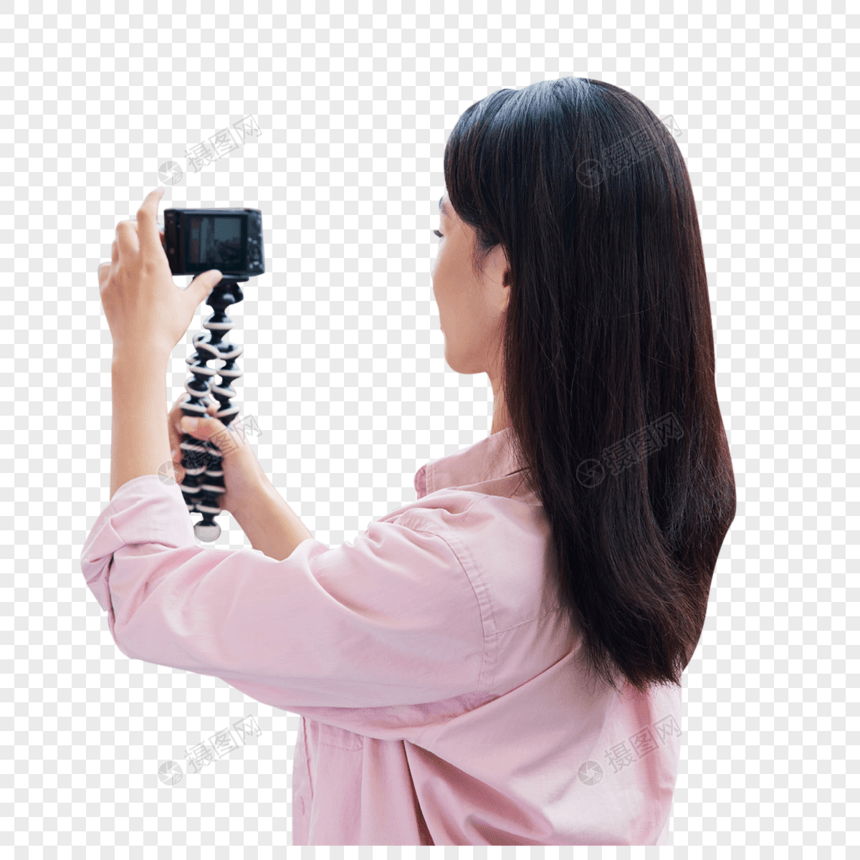 女视频博主拿相机记录生活图片