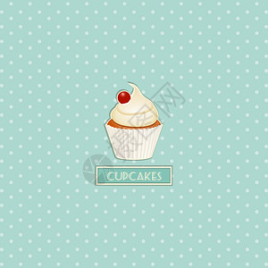 Cupcake蛋糕和樱桃在蓝色波尔卡圆点背景图片