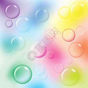 五颜六色的气泡漂浮在彩虹背景的空气中图片