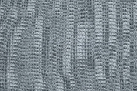 针织物的抽象质地或以人字形编织的灰色背景图片