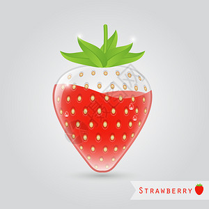 草莓果汁在草莓形状的玻璃图片