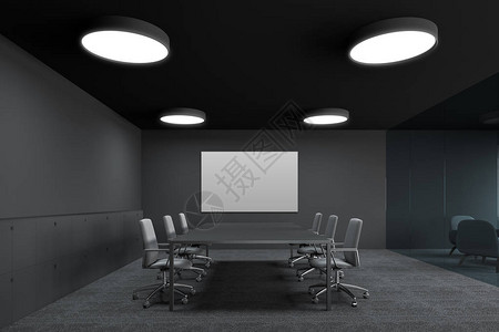 会议室内部有灰色的墙壁铺有地毯的地板带椅子的长桌和墙上的水平海报讨论和谈判的概念3背景图片