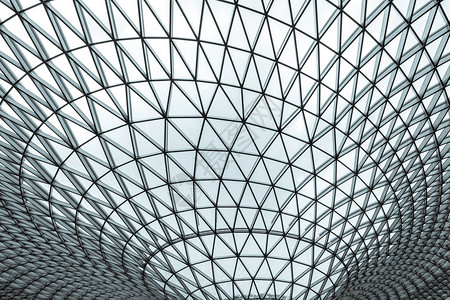 三角花纹结构的玻璃钢建筑未来主义建筑新未来主义建筑风格白色三角形几何圆顶纹理现代建筑的背景图片
