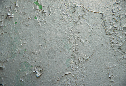 生锈铁上裂开的油漆的旧抽象背景图片